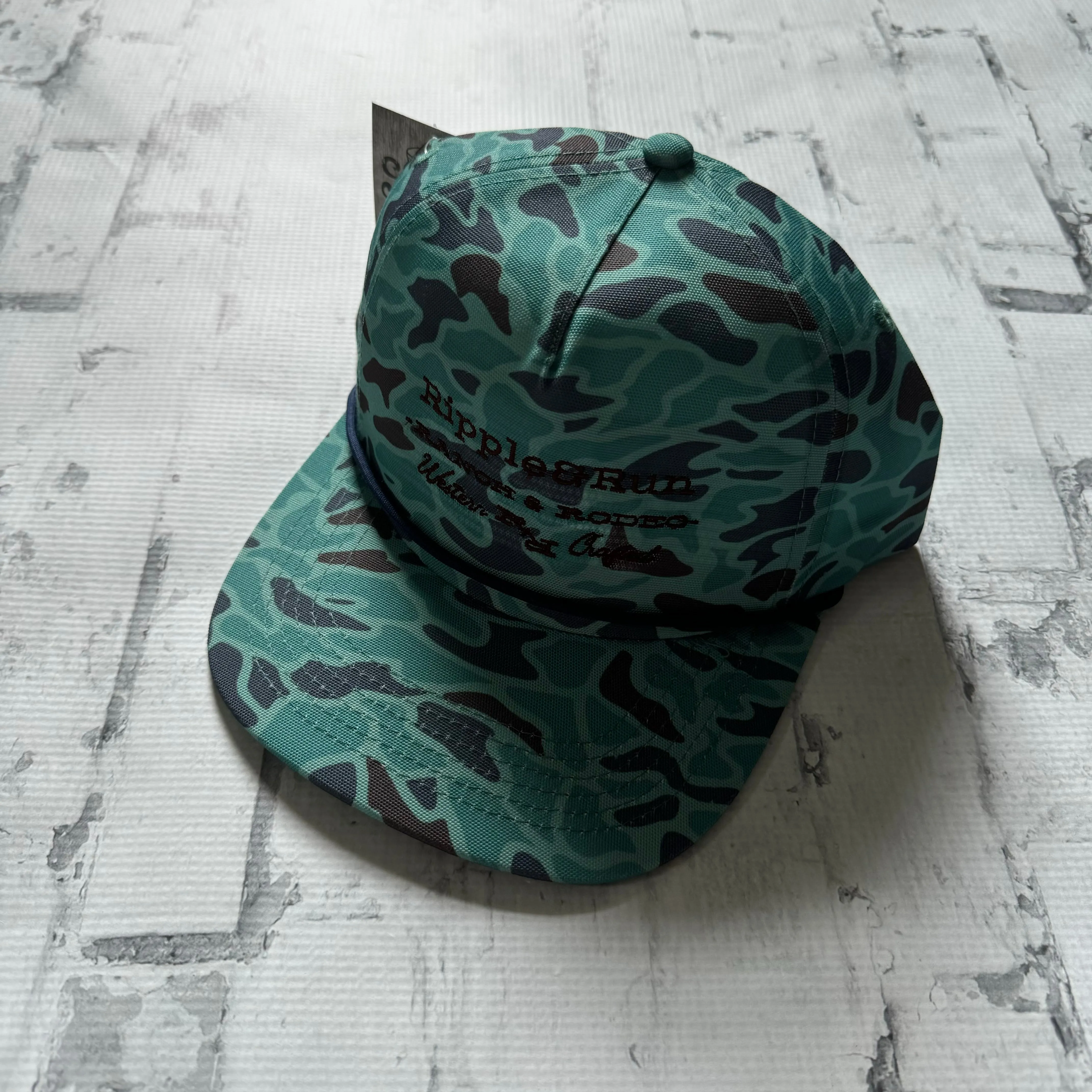 Ripple and Run “Lettering" Hat - Aqua Camo with Navy Rope